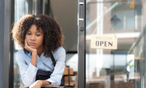 Sad_Small_Business_Owner_Standing